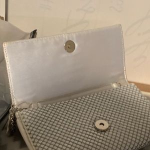 White metal sequin Mundi clutch bag